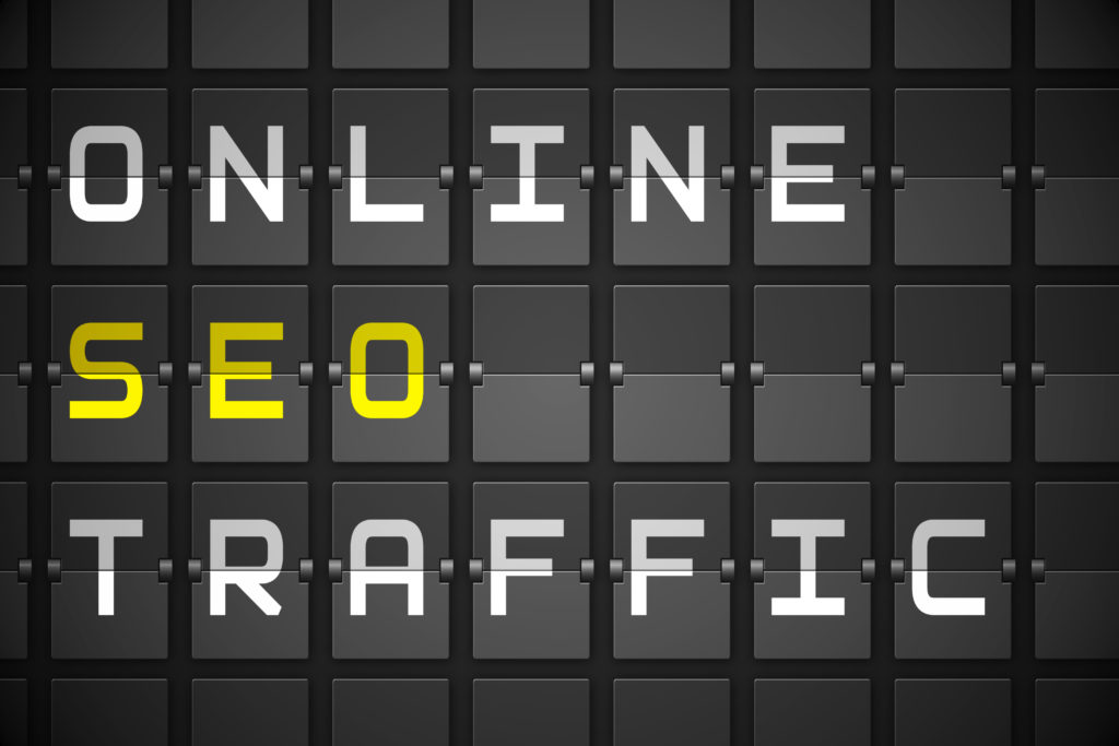 Online seo traffic sign on a dark background.
